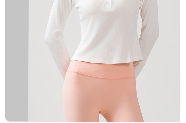 Half-Buttoned Solid Long-Sleeve Top