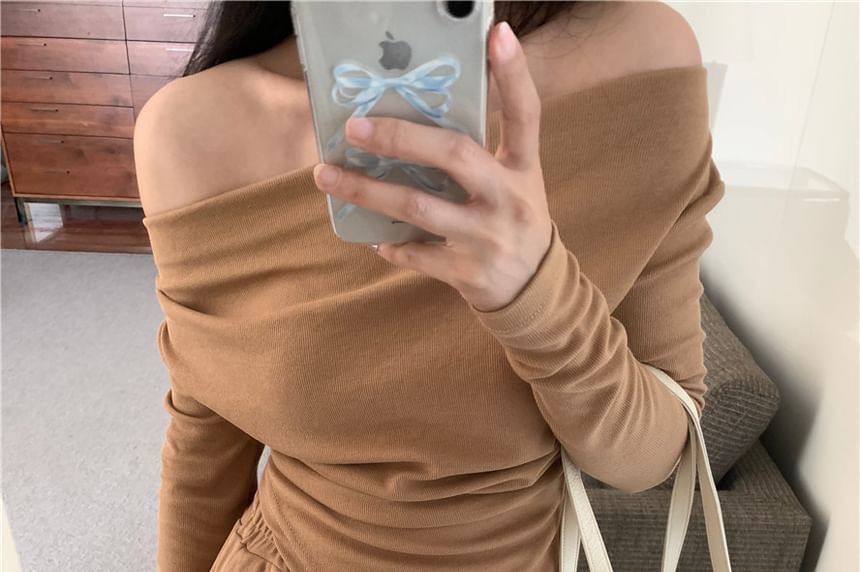 Matching Set: Asymmetric Off-Shoulder Top and High-Waist Pants