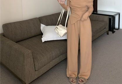 Matching Set: Asymmetric Off-Shoulder Top and High-Waist Pants