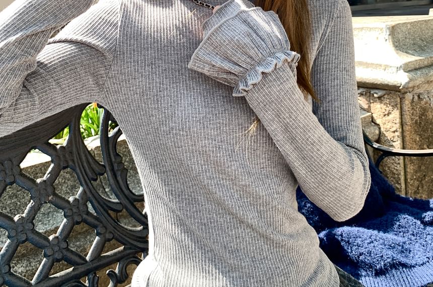 Ruffle-Trim Mock Neck Blouse with Long Sleeves