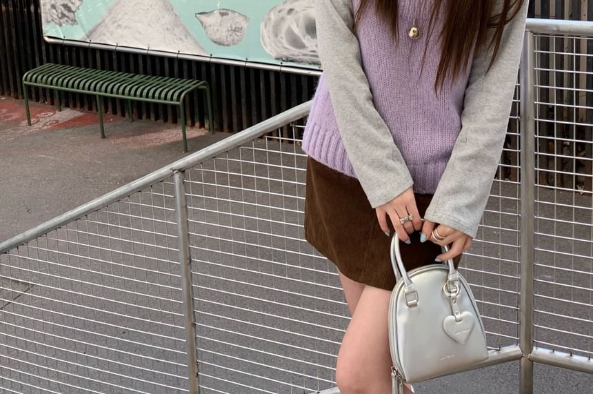 Crewneck Long-Sleeve Tee Paired with Sleeveless Knit
