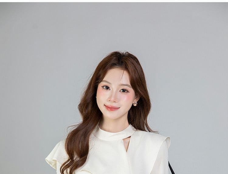 Asymmetrical Cutout Long-Sleeve Blouse in Solid Color