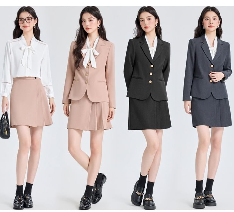 Coordinated Set: Blazer, Pleated Mini Skirt, and Tie Neck Blouse