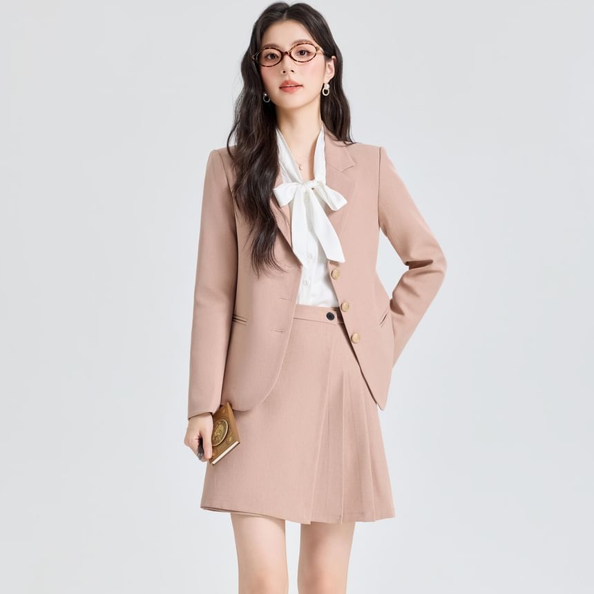 Coordinated Set: Blazer, Pleated Mini Skirt, and Tie Neck Blouse