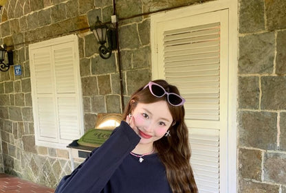 Set: Long-Sleeve Crew Neck Plain Sheer Panel Tie Back T-Shirt + Elastic Waist Frill Trim Mini A-Line Skirt