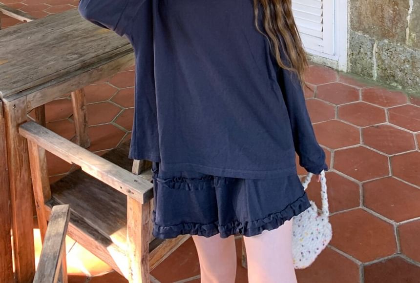 Set: Long-Sleeve Crew Neck Plain Sheer Panel Tie Back T-Shirt + Elastic Waist Frill Trim Mini A-Line Skirt