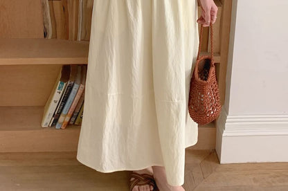 Set: Sleeveless Round Neck Plain Ruffle Trim Top + Mid Rise Maxi A-Line Skirt