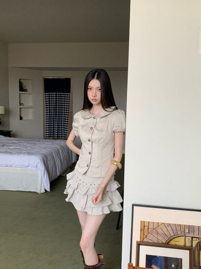 Short Sleeve Collared Contrast Stitch Blouse / High Waist Studded Tiered Mini A-Line Skirt
