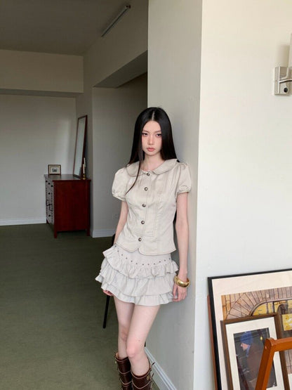 Short Sleeve Collared Contrast Stitch Blouse / High Waist Studded Tiered Mini A-Line Skirt