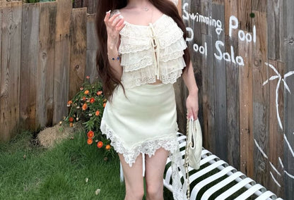 Lace Sleeveless Crop Top with High-Waisted Asymmetric Mini Skirt
