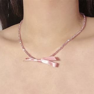Beaded Necklace With Bow Pendant