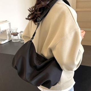 Sac à bandoulière zippé en toile unie