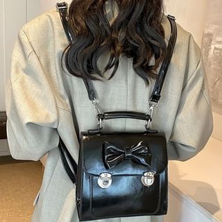Bow Faux Leather Flap Backpack