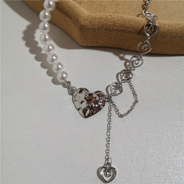 Collier coeur en perles argentées