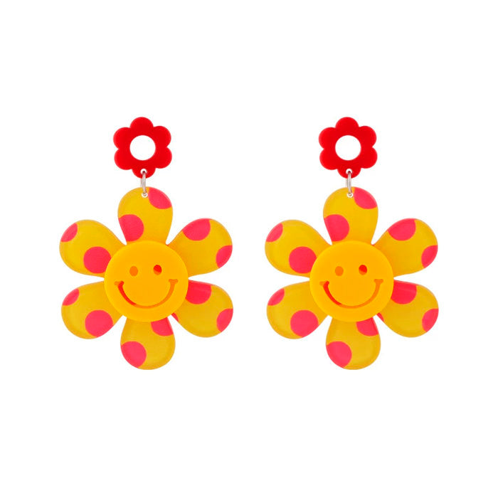 Boucles d'oreilles jolies fleurs souriantes