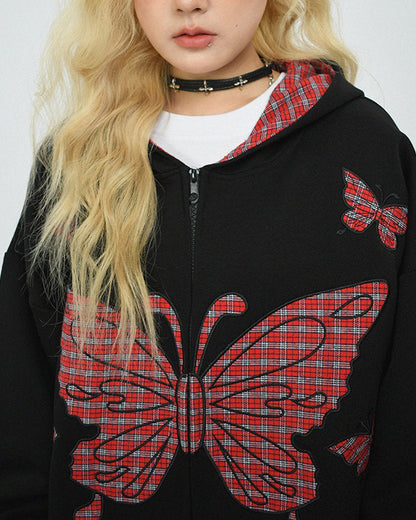 This 90's grunge hoodie features an oversized fit, plaid butterfly patches on the chest and sleeves, and a zip-up closure on the front. The hood is lined with red plaid fabric - boogzel clothing