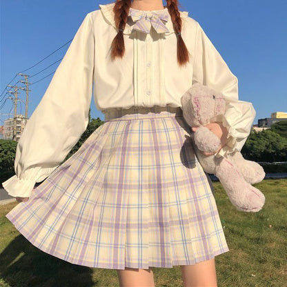 Chemisier à manches longues et bordure à volants