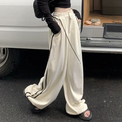 Long-Sleeve Round Neck Plain Cutout Crop Tee / Drawstring Waist Striped Wide Leg Sweatpants