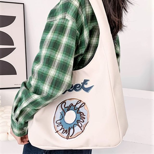 Schultertasche mit Donut-Stickerei