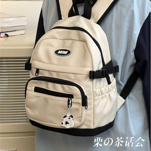 Sac à dos multi-poches avec appliques / Bijou de sac / Ensemble