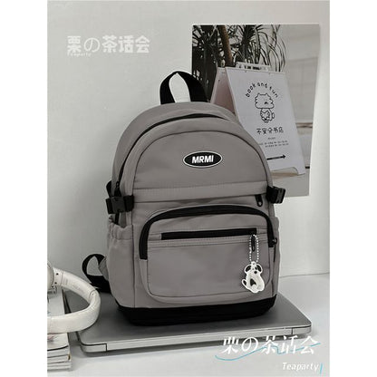 Sac à dos multi-poches avec appliques / Bijou de sac / Ensemble