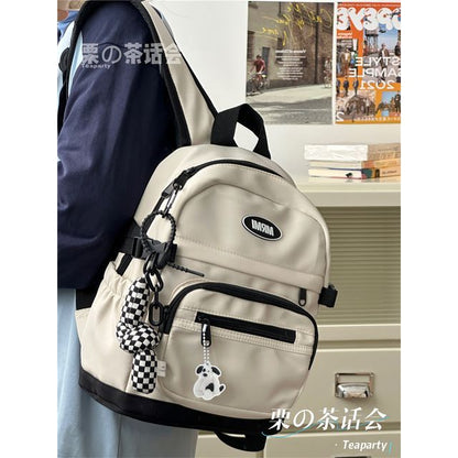 Sac à dos multi-poches avec appliques / Bijou de sac / Ensemble