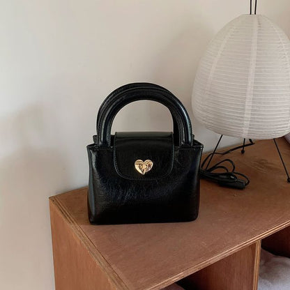 Heart Lock Faux Leather Handbag