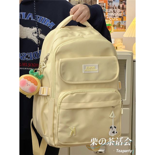 Plain Lettering Logo Buckled Backpack