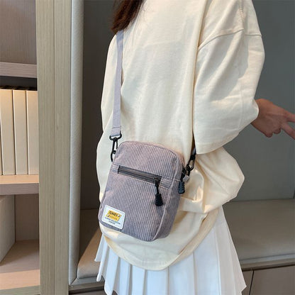 Sac bandoulière à appliques