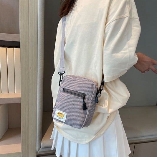 Sac bandoulière à appliques