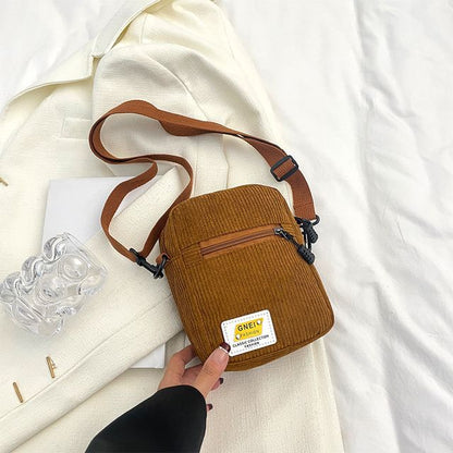 Sac bandoulière à appliques