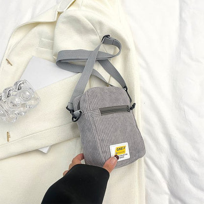 Sac bandoulière à appliques