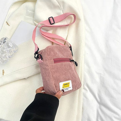 Sac bandoulière à appliques