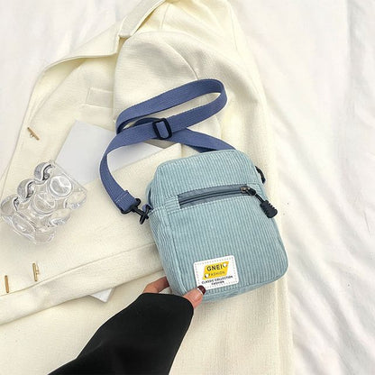 Sac bandoulière à appliques