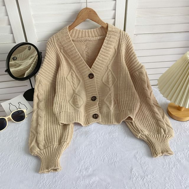 Cardigan uni en maille torsadée à col en V et boutons