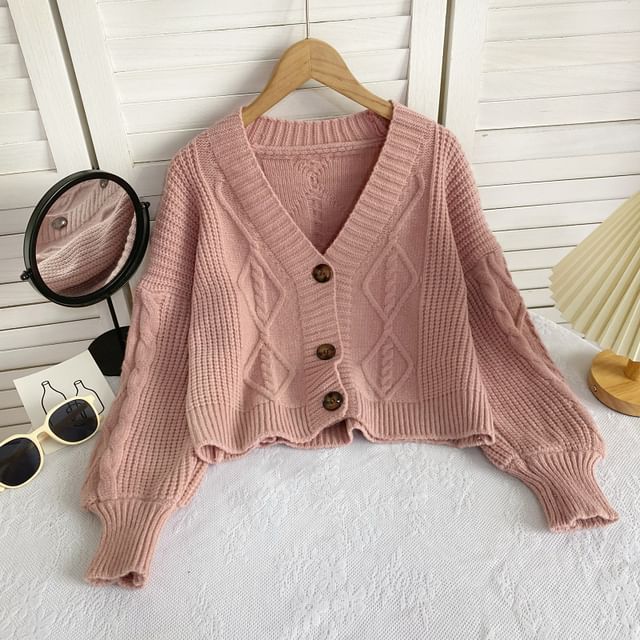 Cardigan uni en maille torsadée à col en V et boutons