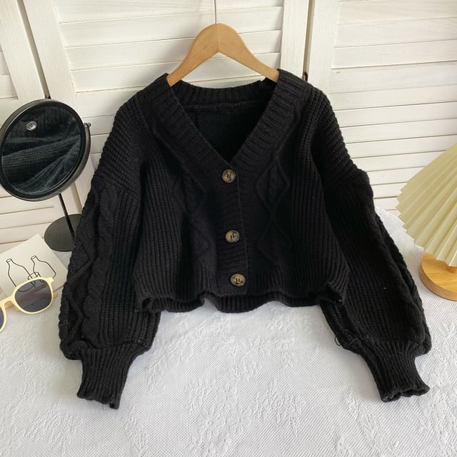 Cardigan uni en maille torsadée à col en V et boutons