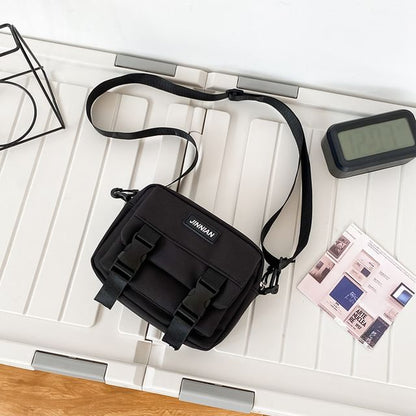 Sac bandoulière zippé avec lettrage