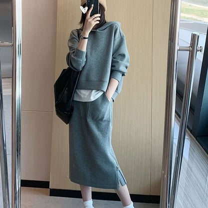 Long-Sleeve Hoodie Paired with High-Rise A-Line Skirt