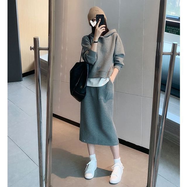Long-Sleeve Hoodie Paired with High-Rise A-Line Skirt