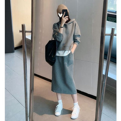 Long-Sleeve Hoodie Paired with High-Rise A-Line Skirt