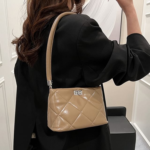 Quilted Twisted Bucket Bag