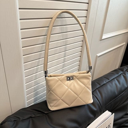 Quilted Twisted Bucket Bag