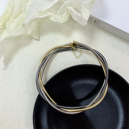 Layered Alloy Choker