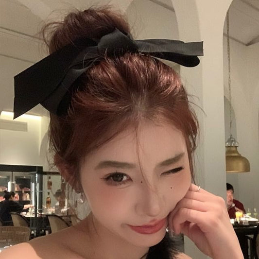 Pince à cheveux en tissu avec nœud