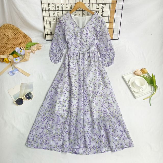 Robe trapèze mi-longue à imprimé floral, manches aux coudes, col en V et boutons