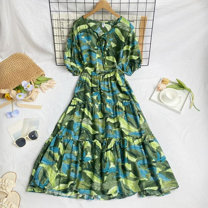 Kurzärmliges, gemustertes Midi-A-Linien-Kleid mit Rundhalsausschnitt und Stufenschnürung vorn