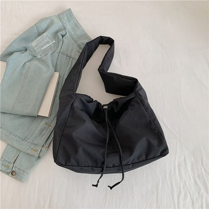 Sac bandoulière uni avec cordon de serrage