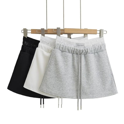 Paneled High-Waist A-Line Mini Skirt