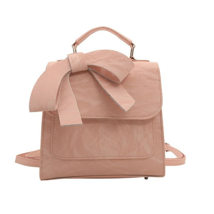 Patterned Bow Flap Backpack